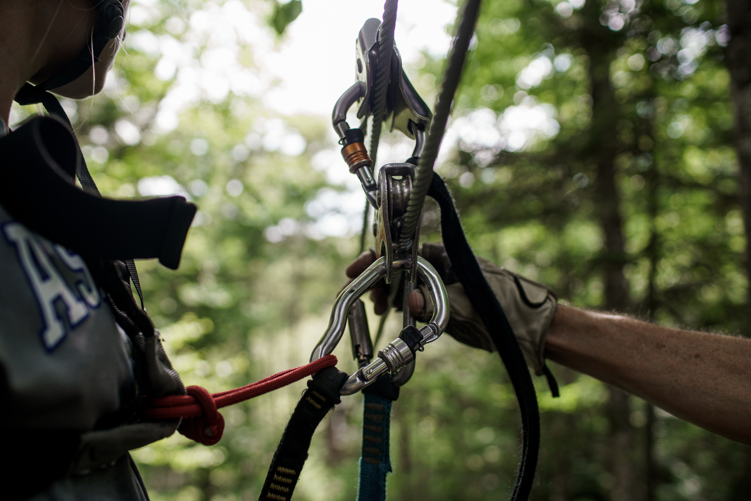 A close-up of harness gear for zip-lining.