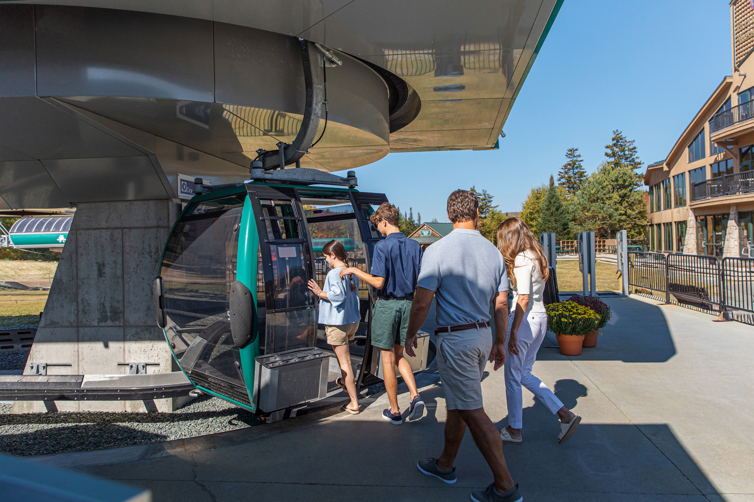 Family boarding the Bretton Woods Scenic Skyway Gondola in the summer