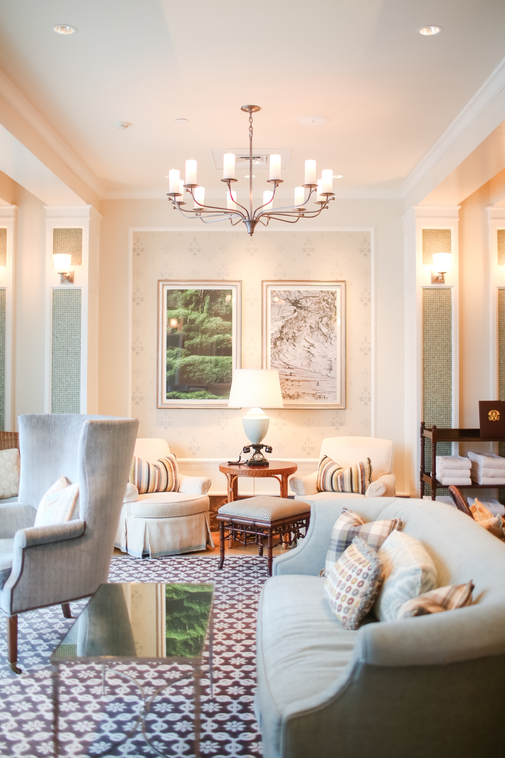 Elegant spa lounge with soft seating, warm lighting, and cozy decor at Mount Washington Resort and Spa.