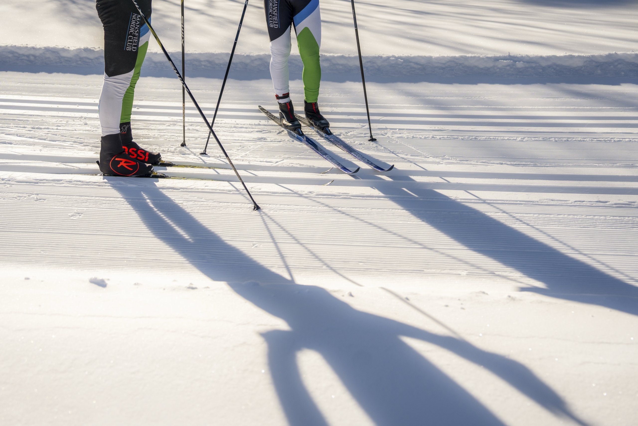 A close-up of nordic skis on a trail at Bretton Woods.