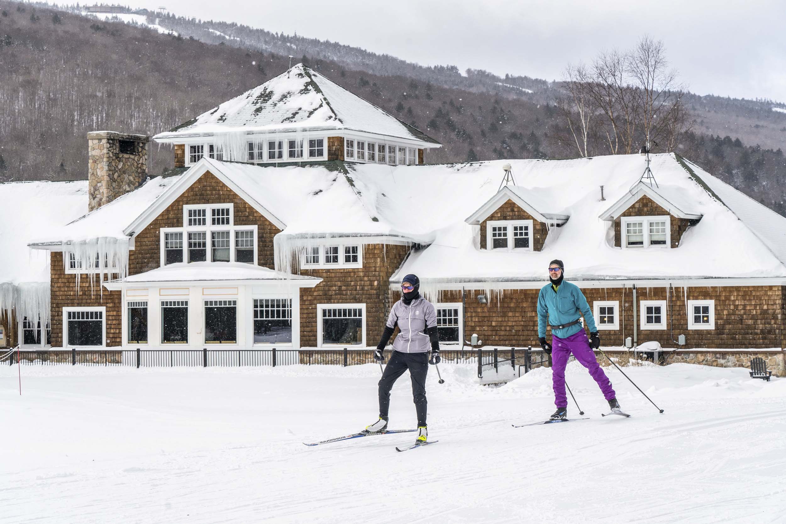 Two nordic skiers head out from the Nordic Center at Bretton Woods.