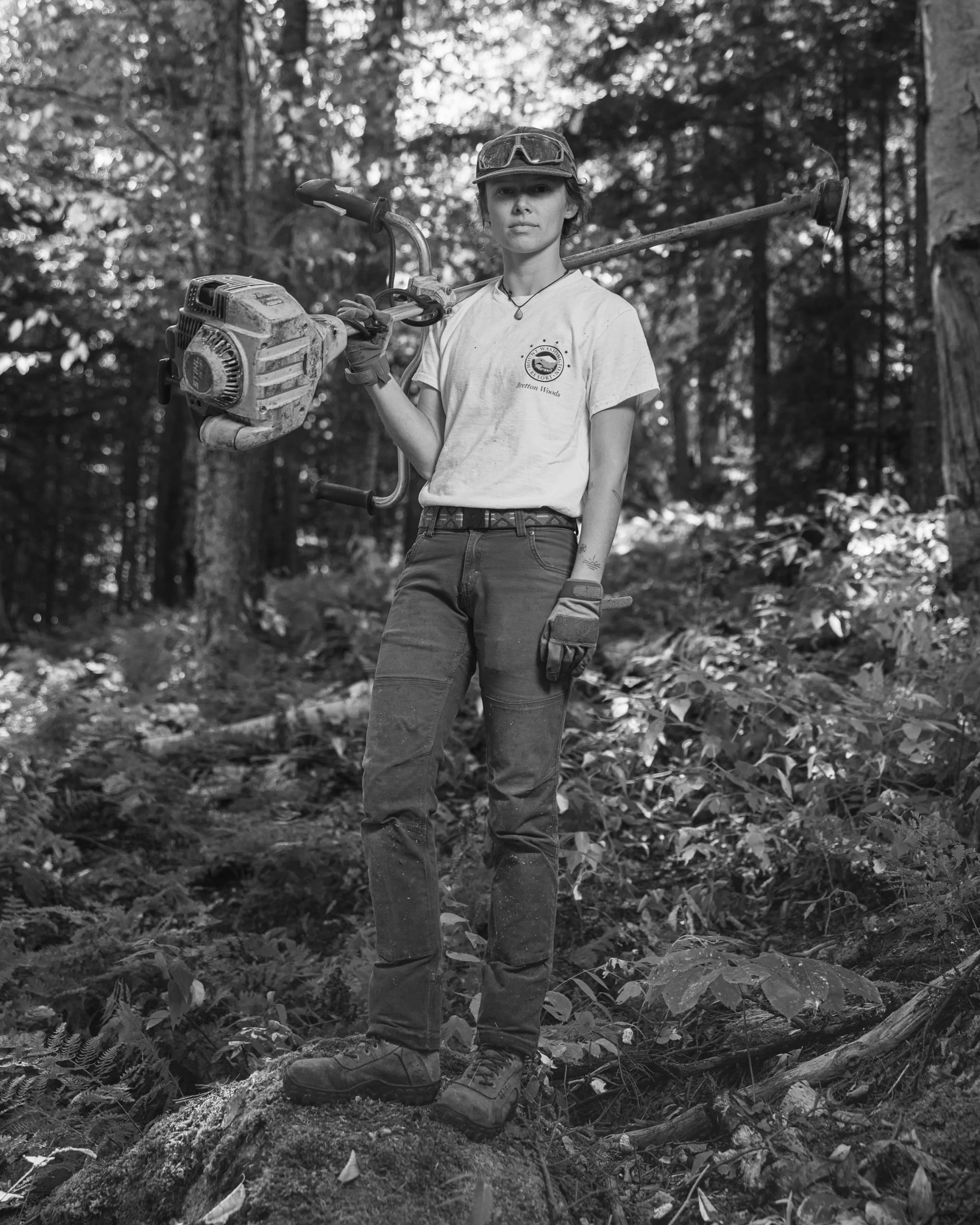 Black and white portrait of Bretton Woods Ski Area trail crew in the woods during a summer work day.