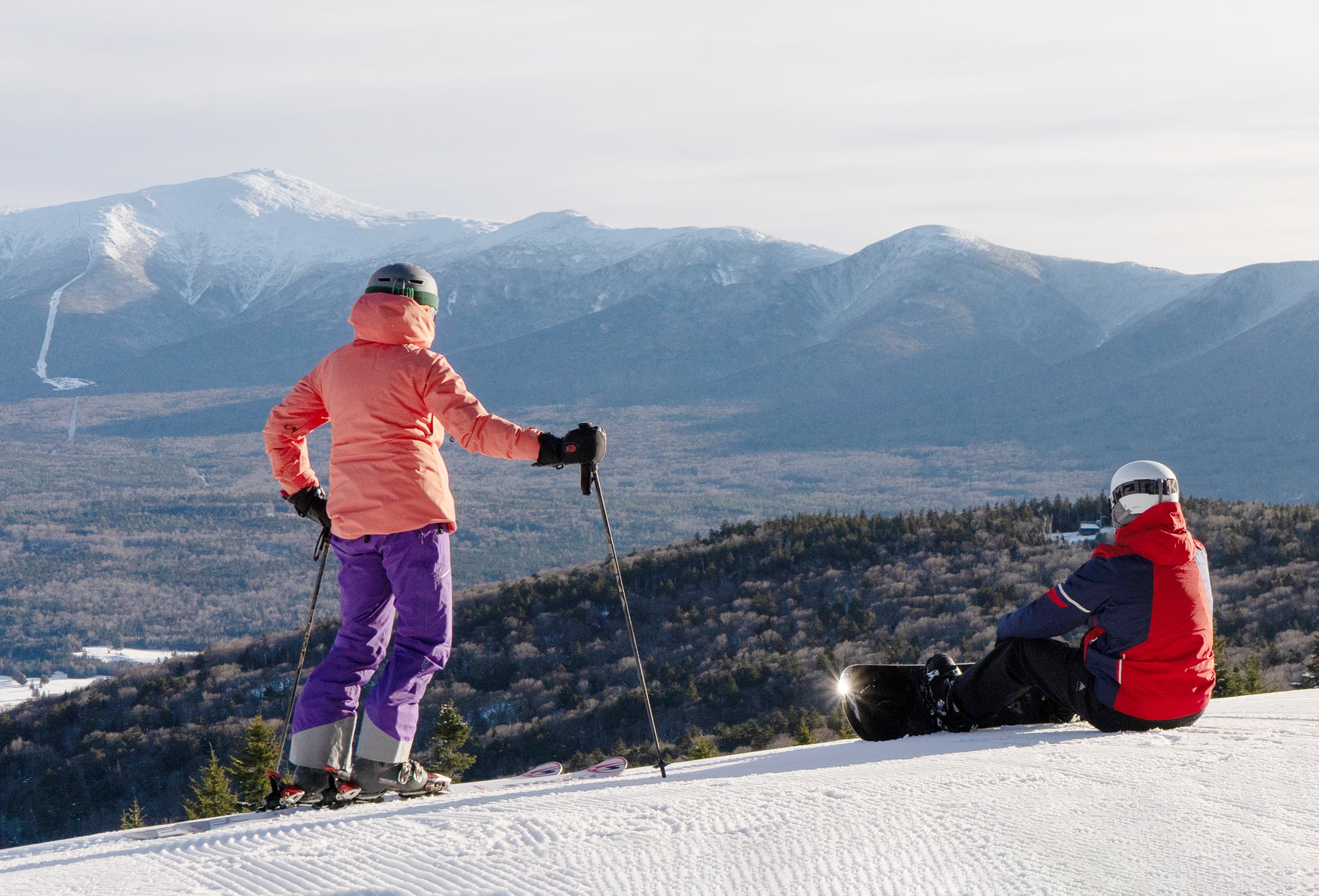 Bretton Woods skiers resting on sunny day overlooking Presidential Range