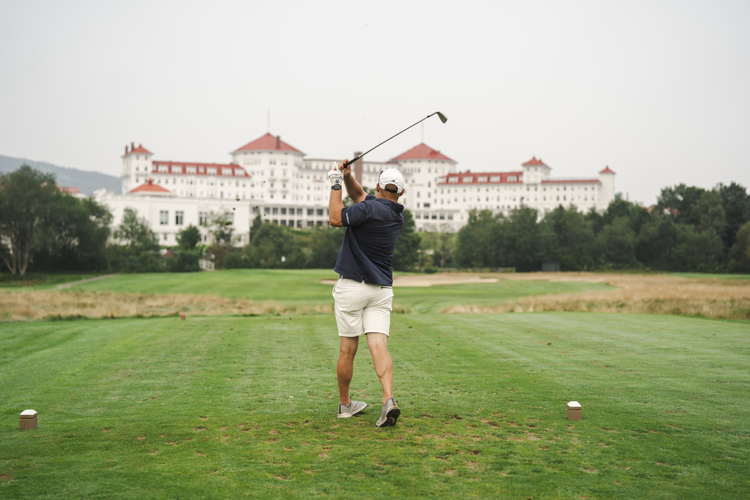 Man swinging golf club