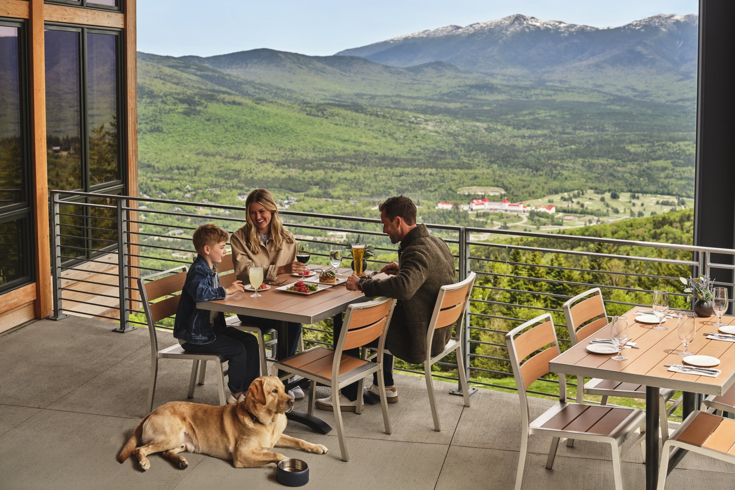 Family eating lunch at Switchback with dog at bretton woods