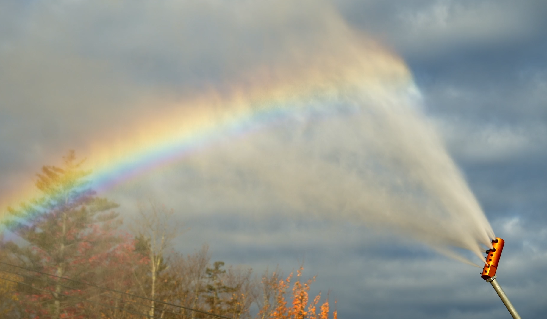 Bretton Woods snowmaking gun with rainbow
